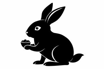 beautiful black eating rabbit silhouette with white background