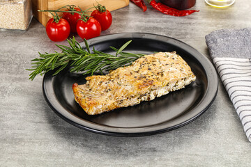 Baked salmon fish served rosemary