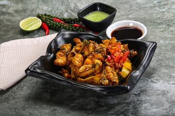 Vietnamese cuisine - fried frog with vegetables