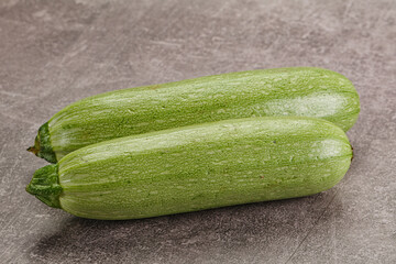 Raw green ripe zucchini vegetable