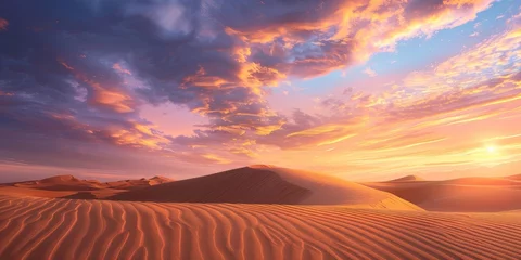 Muurstickers The sun dips below the horizon, casting a warm glow over the sand dunes under a dramatic sky © Kate Simon