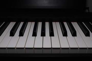 Fototapeta premium Piano keyboard close-up. Hammer effect of a piano keyboard.
