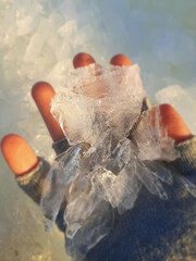 Ice in my hand. Ice Melting In Spring. Spring ice drift on the river.
