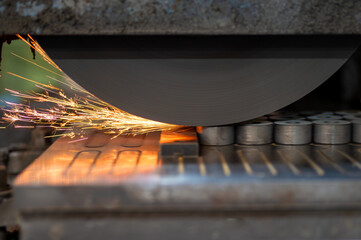 Finishing metal working on horizontal surface grinder machine. High quality photo