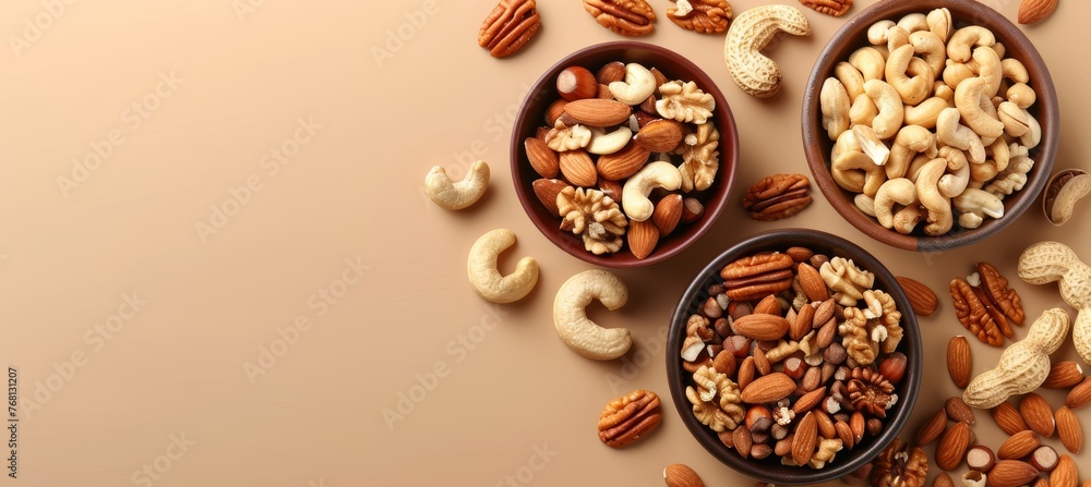 Aufkleber selection of nuts on warm brown surface with ample space for text placement to enhance visibility