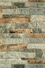 Ceramic tiles imitating stone wall close up