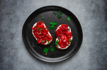 Sandwiches with gravlax salmon, cream cheese, capers, greens, breakfast, homemade,