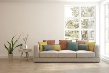 Poster Grey living room concept with sofa and summer landscape in window. Scandinavian interior design. 3D illustration © AntonSh