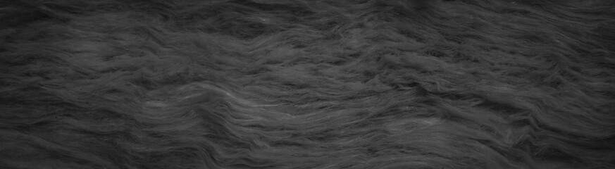 black mineral wool with a visible texture - obrazy, fototapety, plakaty