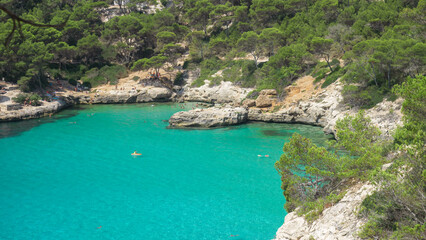 Aerial top view of Cala Mitjana in Menorca, Spain