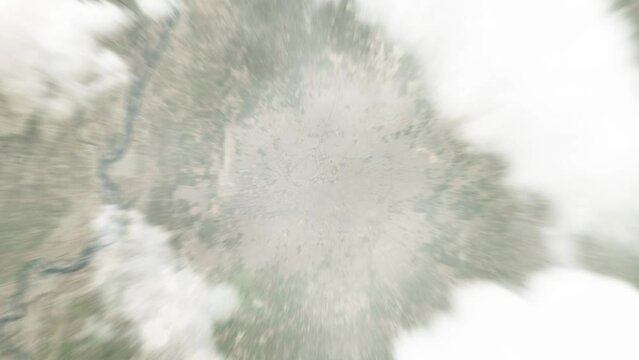 Earth zoom in from space to Multan, Pakistan. Followed by zoom out through clouds and atmosphere into space. Satellite view. Travel intro. Images from NASA