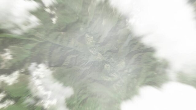 Earth zoom in from space to Daga, Bhutan. Followed by zoom out through clouds and atmosphere into space. Satellite view. Travel intro. Images from NASA