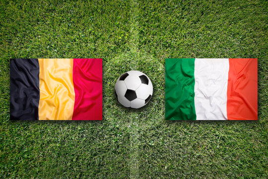 Belgium vs. Italy flags on soccer field