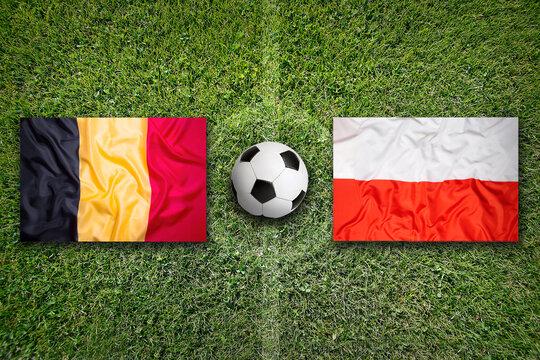 Belgium vs. Poland flags on soccer field