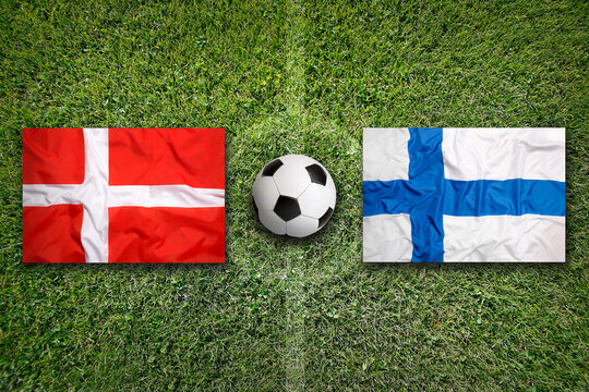 Denmark vs. Finland flags on soccer field