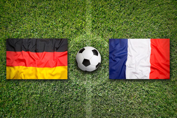 Germany vs. France flags on soccer field