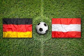 Germany vs. Austria flags on soccer field