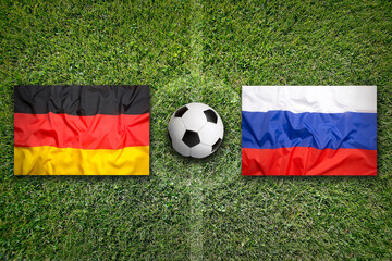 Germany vs. Russia flags on soccer field