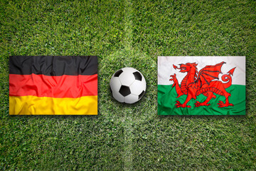 Germany vs. Wales flags on soccer field