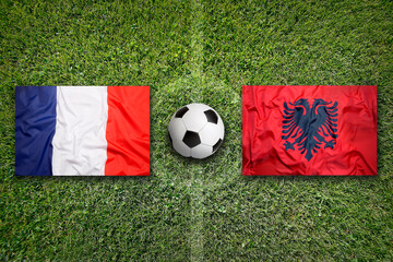 France vs. Albania flags on soccer field