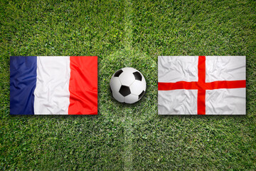 France vs. England flags on soccer field