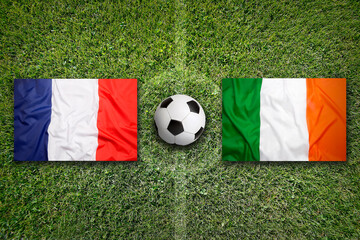 France vs. Ireland flags on soccer field