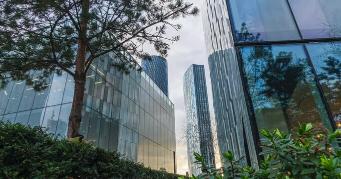 Deansgate square Manchester time lapse showing clouds moving over the glassed facade of high rises