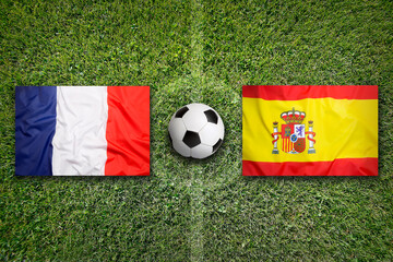 France vs. Spain flags on soccer field