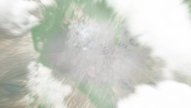 Earth zoom in from space to Ulaangom, Mongolia. Followed by zoom out through clouds and atmosphere into space. Satellite view. Travel intro. Images from NASA