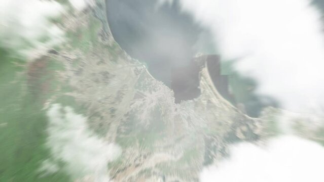 Earth zoom in from space to Wonsan, North Korea. Followed by zoom out through clouds and atmosphere into space. Satellite view. Travel intro. Images from NASA
