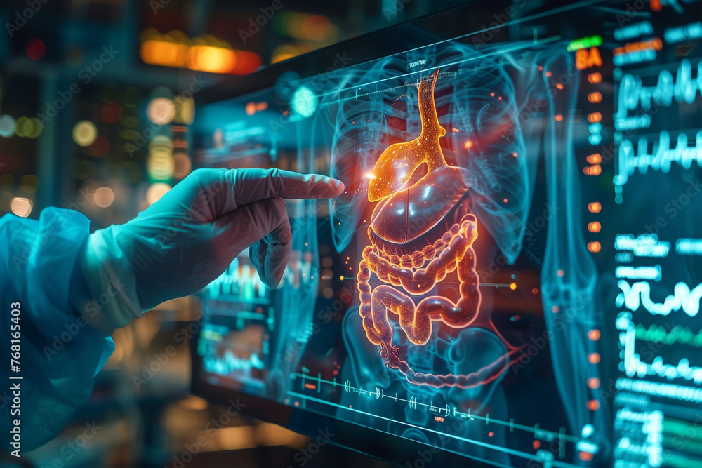 Aufkleber Hand pointing at a computer screen with a picture of human internal organs.