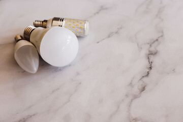 a light bulb that is on a marble counter