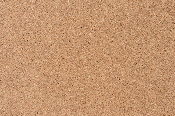 Brown textured cork board background. Textured wooden background. Cork board with copy space.