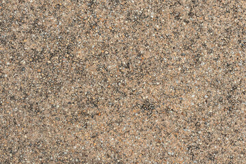 Blank concrete brown rough wall for background. Beautiful brown exposed aggregate wall plastered...
