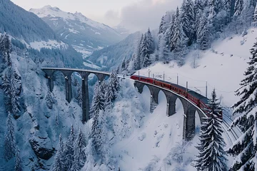 Photo sur Plexiglas Viaduc de Landwasser Majestic Journey Through the Swiss Alps  Aerial View of a Train Traversing the Landwasser Viaduct in Winter