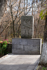 An old khachkar (cross-stone) situated in the park, Vanadzor