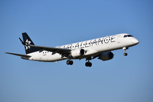 Star Alliance Embraer 195 airplane (I-ADJV) close up view before landing at Warsaw Chopin airport. WARSAW, POLAND - OCTOBER 31, 2021
