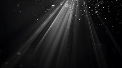 Light rays shining down from the top of the image with dust particles floating around in the air.