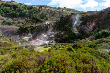 Surreal landscape of sulfur fumaroles at Terceira Island, Azores. Captivating natural wonders amid volcanic terrain.