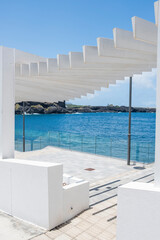 restaurant close to sea with white columns 