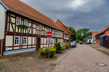 Colorful half-timbered houses in NeustadtHarz, historical medieval Old Town, Thuringen, Germany. - 768194895