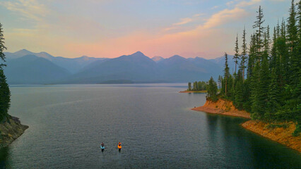 Aerial view of two paddle boarders on Hungry Horse Reservoir, MT.