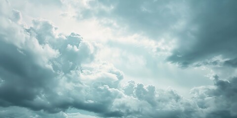 View of a plane flying in the distance against a dramatic grey cloudy sky