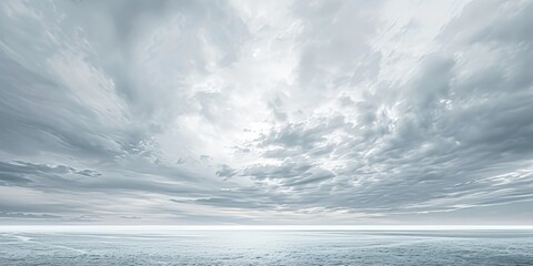 A vast expanse of water under a cloudy sky