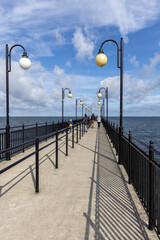 Miedzyzdroje pier, long wooden pier from the beach deep into the Baltic Sea, Miedzyzdroje, Poland