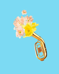 Beautiful natural daffodils emerge from the tuba instrument and flies into the sky. Creative music...
