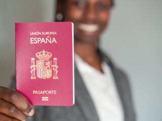 Businesswoman holding her spanish european union passport