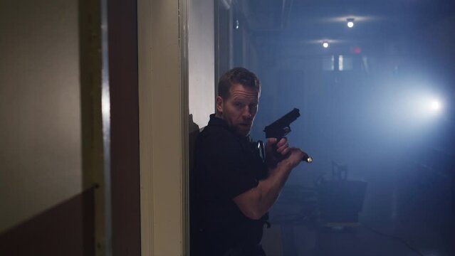 Cop in an action scene with firearm