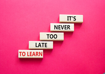 It is Never to Late to Learn symbol. Wooden blocks with words It is Never to Late to Learn....