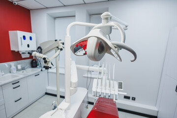 New empty dental office with dental chair for dental treatment. Tools for dental treatment